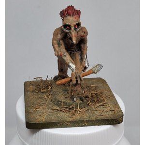 Long Nose Ogre Walking With Spear Miniature Figurine Statue On Stone Slab